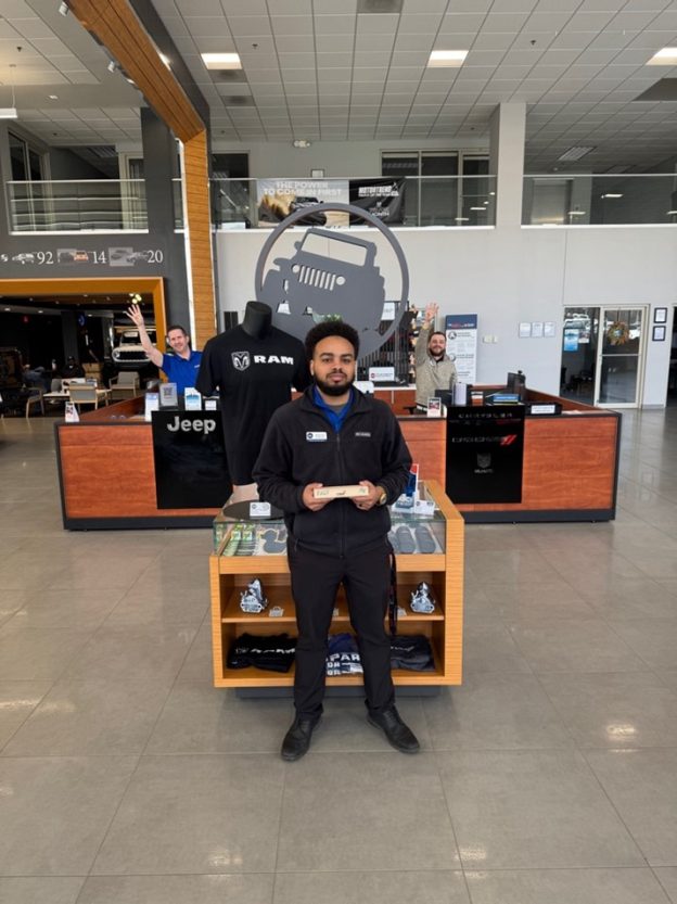 Devin Hall Receives a CODE4 Jenga Pillar for His #UncommonCare at CMA’s CDJR of Lynchburg!